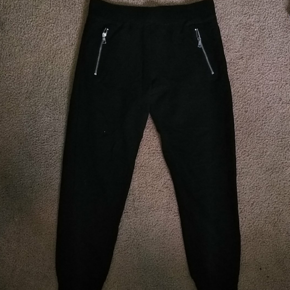 Black joggers with zipper pockets